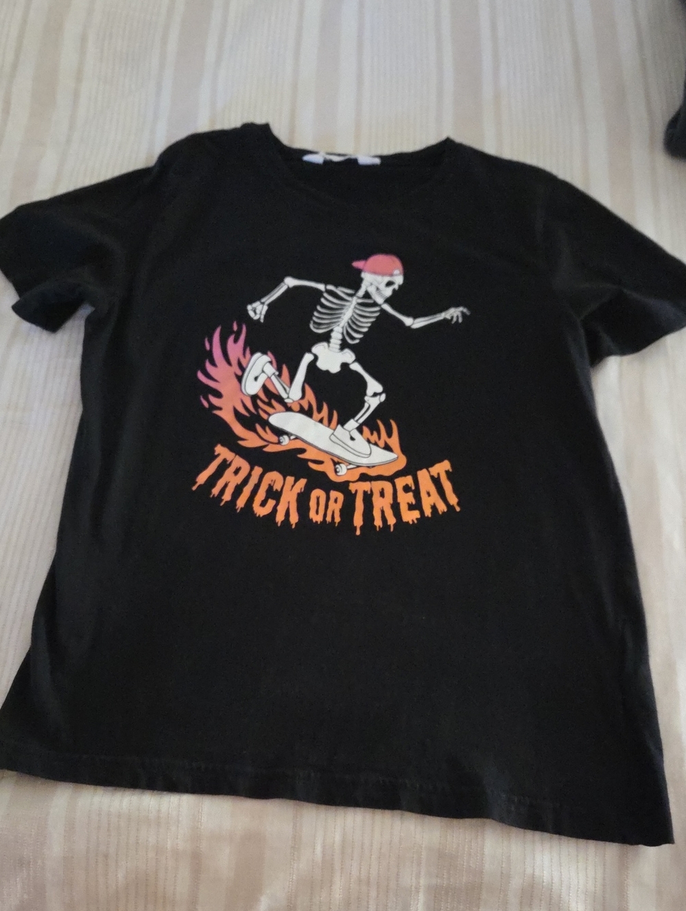 H&M Black Tee with Skeleton Skate 'Trick or Treat' Graphic